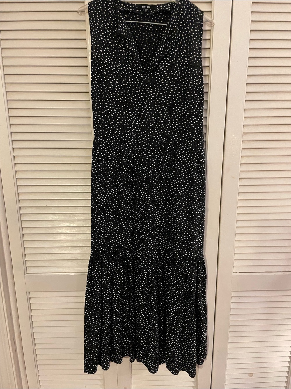 Sleeveless Black Polka Dot Midi Dress with Tiered Hem